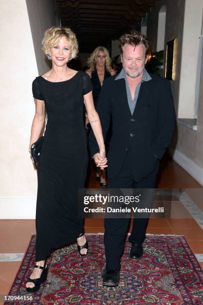 Meg Ryan and John Mellencamp attend Taormina Filmfest 2013 2013 at Teatro Antico on June 20, 2013 in Taormina, Italy.