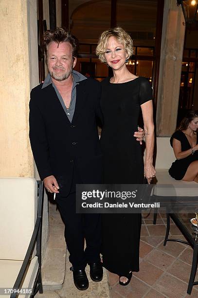 John Mellencamp and Meg Ryan attend Taormina Filmfest 2013 2013 at Teatro Antico on June 20, 2013 in Taormina, Italy.