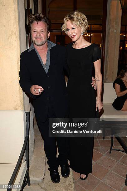 John Mellencamp and Meg Ryan attend Taormina Filmfest 2013 2013 at Teatro Antico on June 20, 2013 in Taormina, Italy.