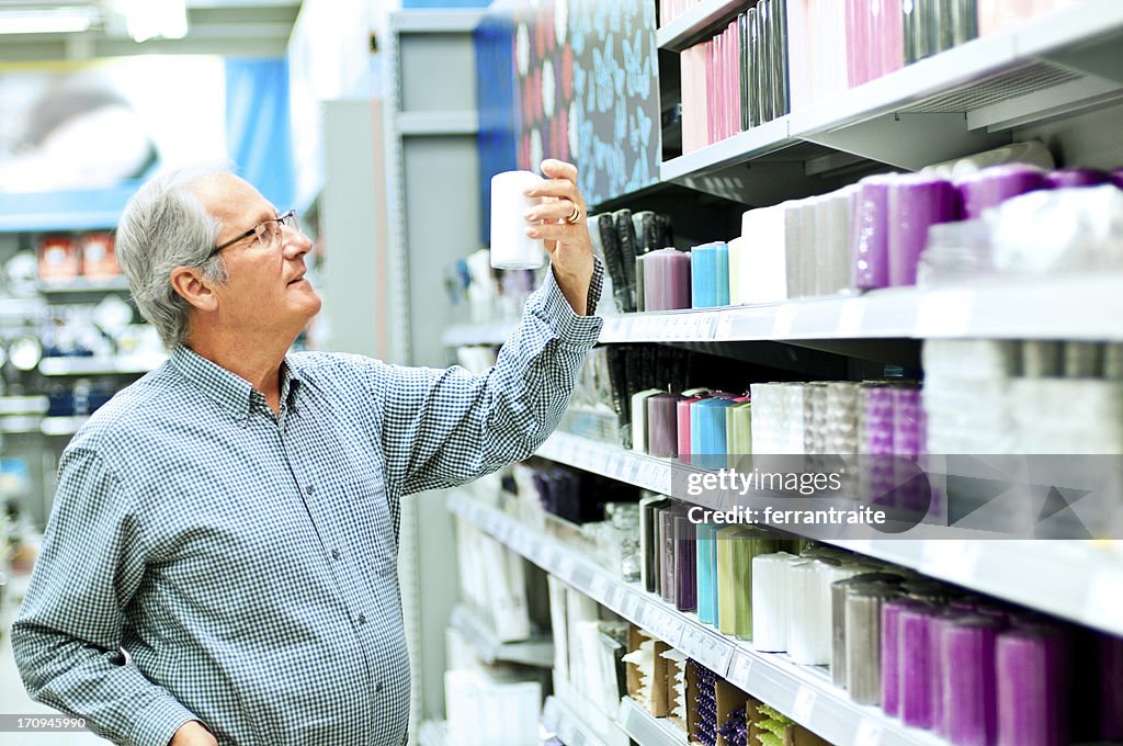 Senior man shopping in supermarket