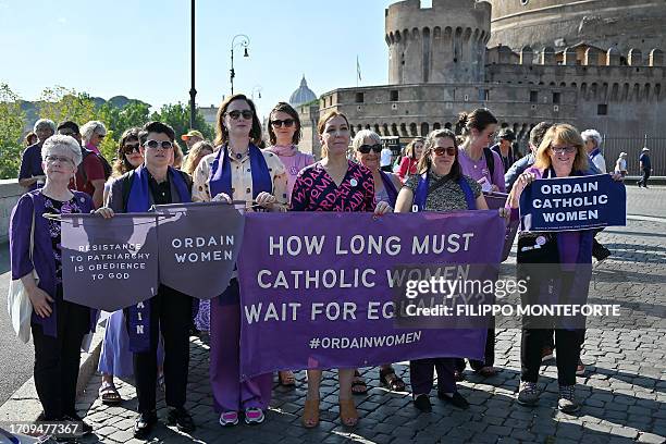 Supporters of Women's Ordination Conference , demonstrate to advocate and pray for the ordination of women as deacons, priests, and bishops into an...