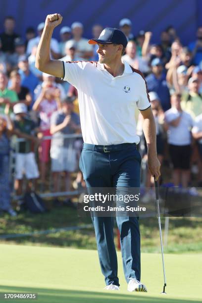 Ludvig Aberg of Team Europe celebrates winning his match alongside teammate Viktor Hovland 9&7 during the Saturday morning foursomes matches of the...