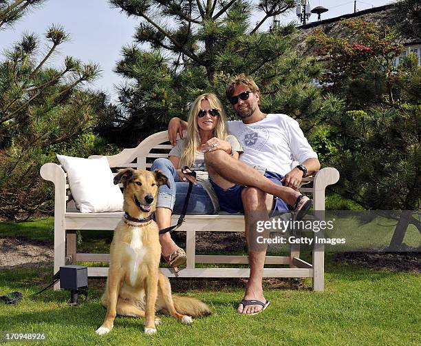 Juergen Klopp and his wife Ulla together with their dog Emma during the Skiclub Kampen season opening on June 20, 2013 in Kampen , Germany.