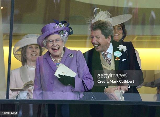 Queen Elizabeth II and John Warren cheer on her horse "Estimate" to win The Gold Cup on Ladies Day on Day 3 of Royal Ascot at Ascot Racecourse on...