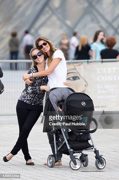 Model Gisele Bundchen and her sister Rafaela Bundchen are sighted near the 'Louvre' museum on June 20, 2013 in Paris, France.