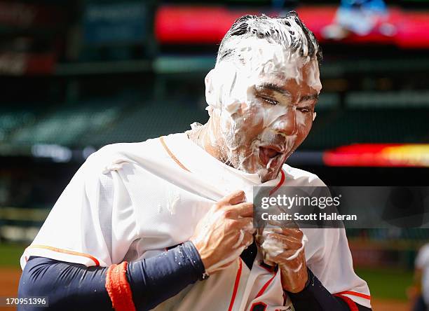 Carlos Pena of the Houston Astros celebrates after his three-run home run in the 10th inning to defeat the Milwaukee Brewers 7-4 at Minute Maid Park...