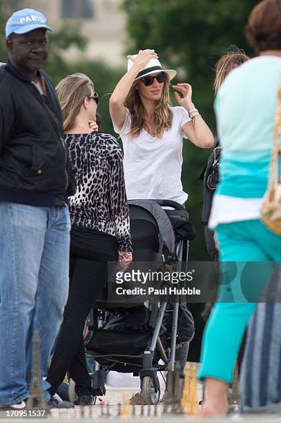 Model Gisele Bundchen is sighted in the 'Tuileries' gardens on June 20, 2013 in Paris, France.