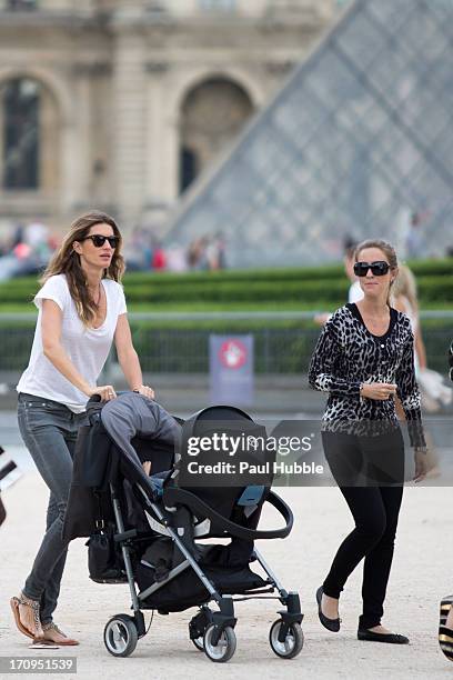 Model Gisele Bundchen and her sister Rafaela Bundchen are sighted near the 'Louvre' museum on June 20, 2013 in Paris, France.