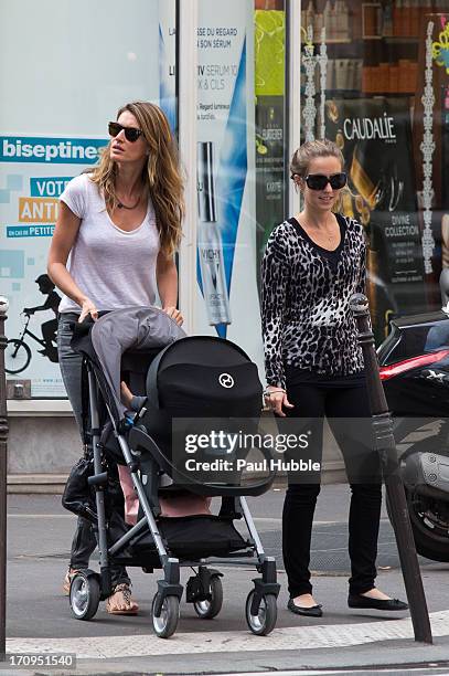 Model Gisele Bundchen and her sister Rafaela Bundchen are sighted on the 'Rue Saint Honore' on June 20, 2013 in Paris, France.