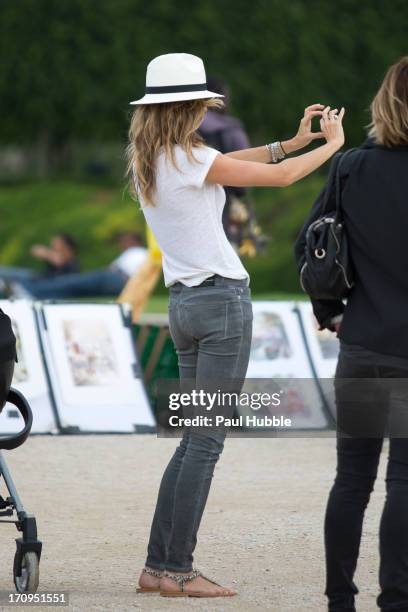 Model Gisele Bundchen is sighted in the 'Tuileries' gardens on June 20, 2013 in Paris, France.
