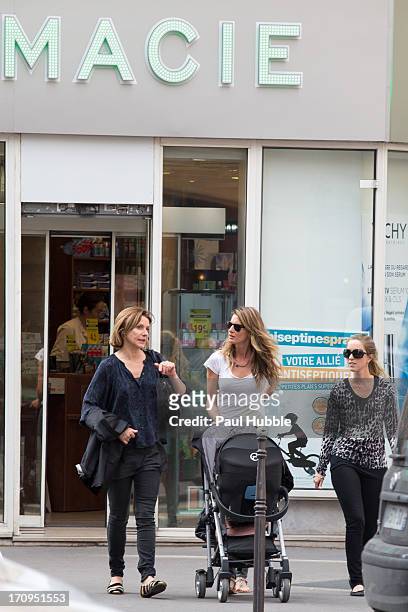 Model Gisele Bundchen and her sister Rafaela Bundchen are sighted on the 'Rue Saint Honore' on June 20, 2013 in Paris, France.