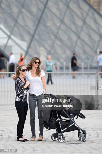 Model Gisele Bundchen and her sister Rafaela Bundchen are sighted near the 'Louvre' museum on June 20, 2013 in Paris, France.