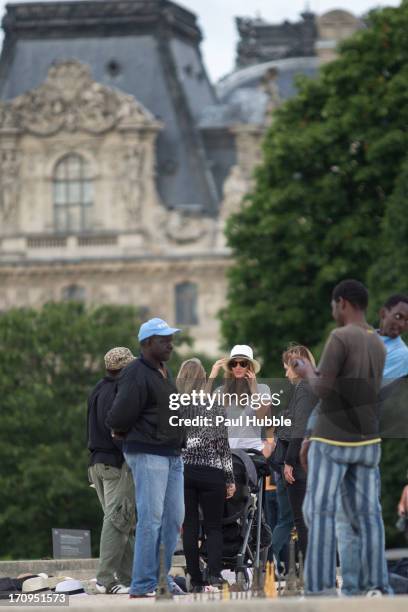 Model Gisele Bundchen is sighted in the 'Tuileries' gardens on June 20, 2013 in Paris, France.