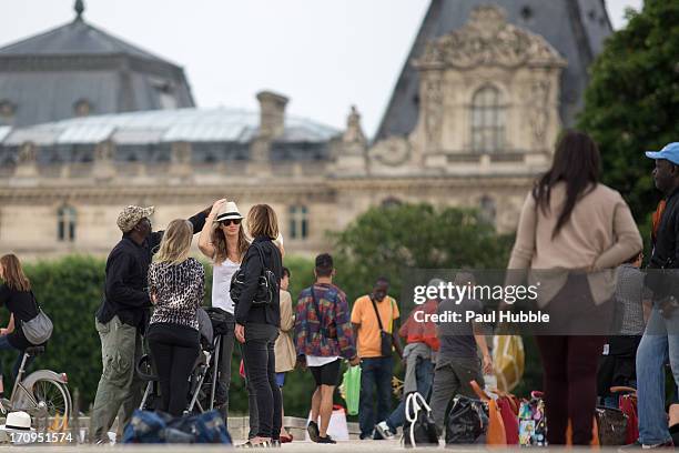 Model Gisele Bundchen is sighted in the 'Tuileries' gardens on June 20, 2013 in Paris, France.