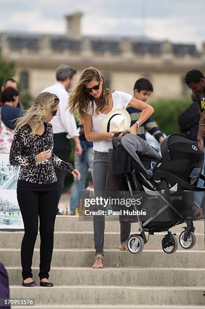 Model Gisele Bundchen and her sister Rafaela Bundchen are sighted in the 'Tuileries' gardens on June 20, 2013 in Paris, France.