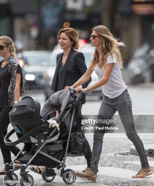 Model Gisele Bundchen and her sister Rafaela Bundchen are sighted on the 'Place Colette' on June 20, 2013 in Paris, France.