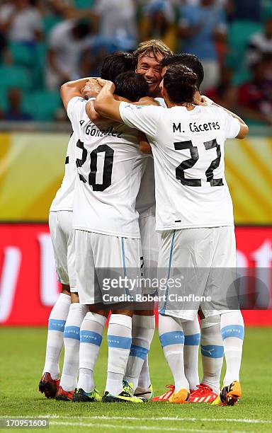 Diego Lugano of Uruguay celebrates with his team-mates after scoring the opening goal during the FIFA Confederations Cup Brazil 2013 Group B match...