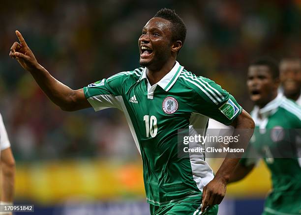 Mikel John Obi of Nigeria celebrates scoring his team's first goal during the FIFA Confederations Cup Brazil 2013 Group B match between Nigeria and...