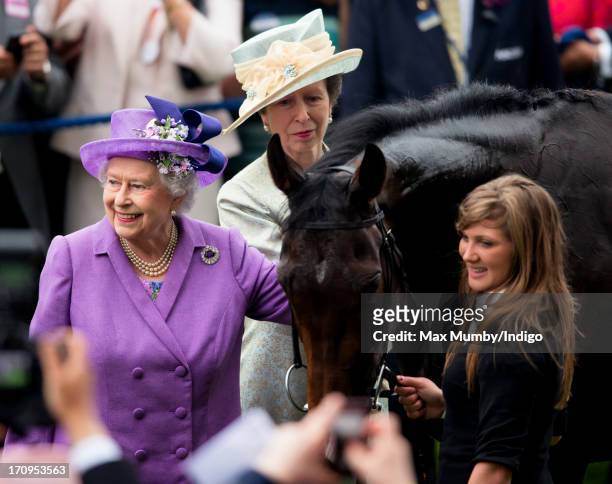 Princess Anne, The Princess Royal looks on as Queen Elizabeth II pats her Gold Cup winning horse Estimate on Ladies Day of Royal Ascot at Ascot...
