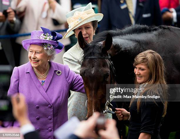 Princess Anne, The Princess Royal looks on as Queen Elizabeth II pats her Gold Cup winning horse Estimate on Ladies Day of Royal Ascot at Ascot...