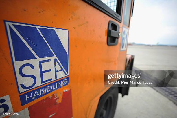 The logo of SEA - Società Esercizi Aeroporuali , is shown at Malpensa airport on June 20, 2013 in Milan, Italy. Malpensa is one of the main...