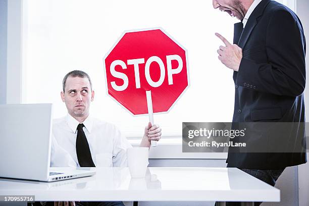 abusive office manager - stop sign stock pictures, royalty-free photos & images