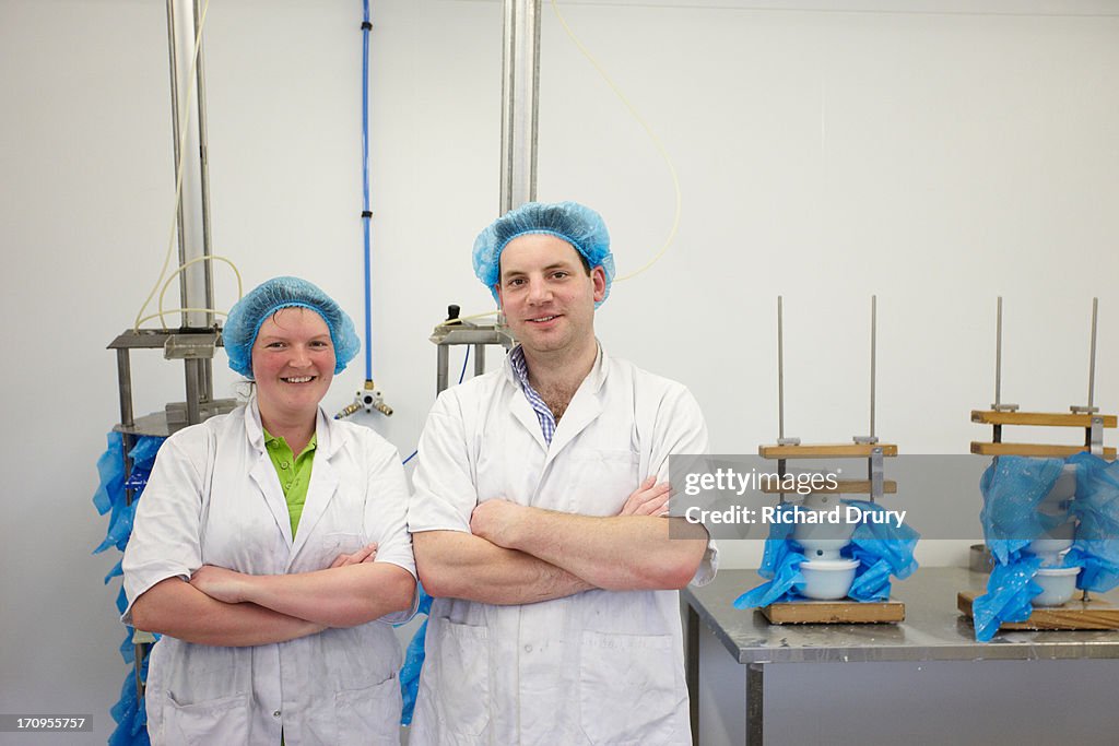 Workers in goats cheese production unit
