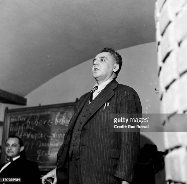 View of the photographer Arthur Fellig , better known as Weegee attending a meeting of the American Society of Media Photographers , New York, 1948.