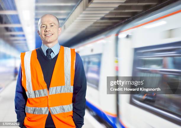 station worker - platform stock pictures, royalty-free photos & images