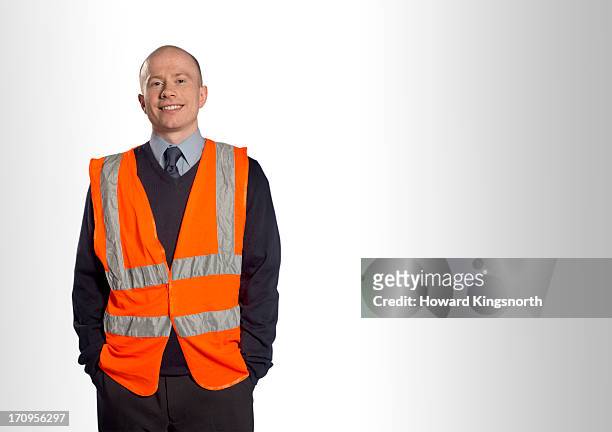 station worker - safety vest stock pictures, royalty-free photos & images