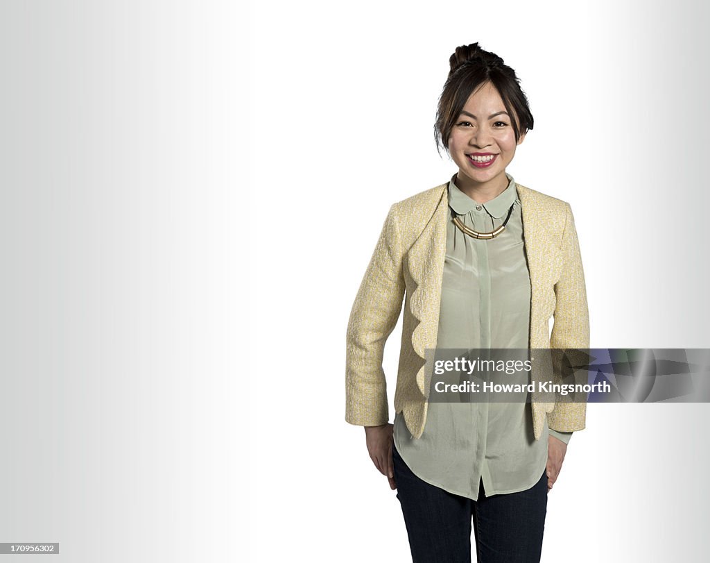 Young female,standing and smiling to camera