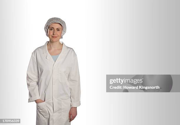 factory worker - hair net stock pictures, royalty-free photos & images