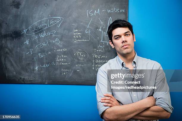 businessman in front of blackboard - chalk wall stock pictures, royalty-free photos & images