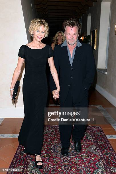 John Mellencamp and Meg Ryan attend Taormina Filmfest 2013 2013 at Teatro Antico on June 20, 2013 in Taormina, Italy.