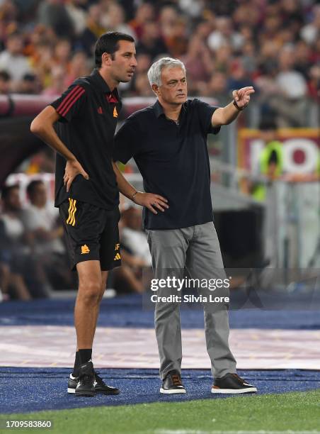 Jose Mourinho head coach of AS Roma talks to Salvatore Foti during the Serie A TIM match between AS Roma and Empoli FC at Stadio Olimpico on...