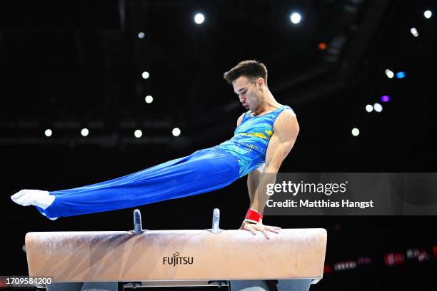 Nariman Kurbanov of Team Kazakhstan competes on Pommel Horse during Men's Qualifications on Day One of the FIG Artistic Gymnastics World...