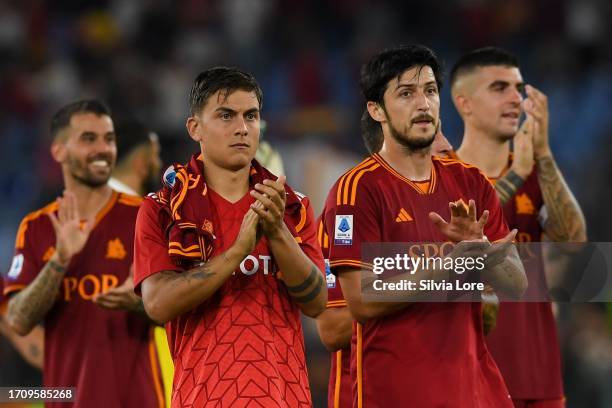 Paulo Dybala of AS Roma and teammate Sardar Azmoun greets the fans at the end of the Serie A TIM match between AS Roma and Empoli FC at Stadio...