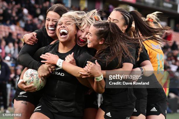 Martha Mataele of New Zealand is congratulated on scoring a try during the Womens International Test Match between the New Zealand Black Ferns and...