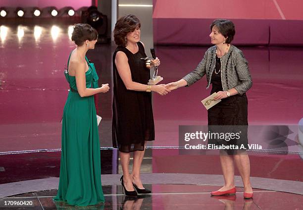 Maria Grazia Roncarolo receives Bellisario award from Minister of Education Maria Chiara Carrozza during the Premio Bellisario 2013 at Dear RAI...