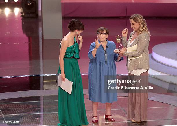 Actress Franca Valeri receives Bellisario award from actress Simona Izzo during the Premio Bellisario 2013 at Dear RAI studios on June 20, 2013 in...