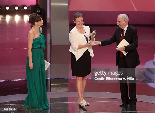 Maria Cannata receives Bellisario award from Antonio Amato during the Premio Bellisario 2013 at Dear RAI studios on June 20, 2013 in Rome, Italy.