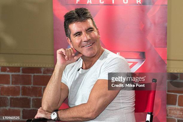 Simon Cowell attends "The X Factor" Judges press conference at Nassau Veterans Memorial Coliseum on June 20, 2013 in Uniondale, New York.