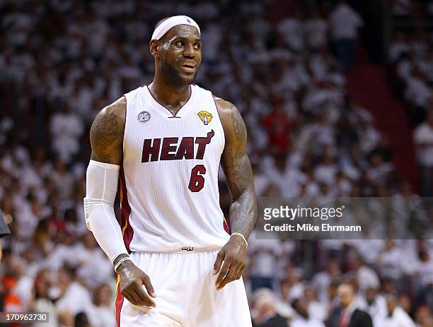 LeBron James of the Miami Heat reacts in the second quarter while taking on the San Antonio Spurs during Game Seven of the 2013 NBA Finals at...
