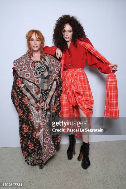 Christina Hendricks and Coco Rocha attend the Vivienne Westwood Womenswear Spring/Summer 2024 show as part of Paris Fashion Week on September 30,...
