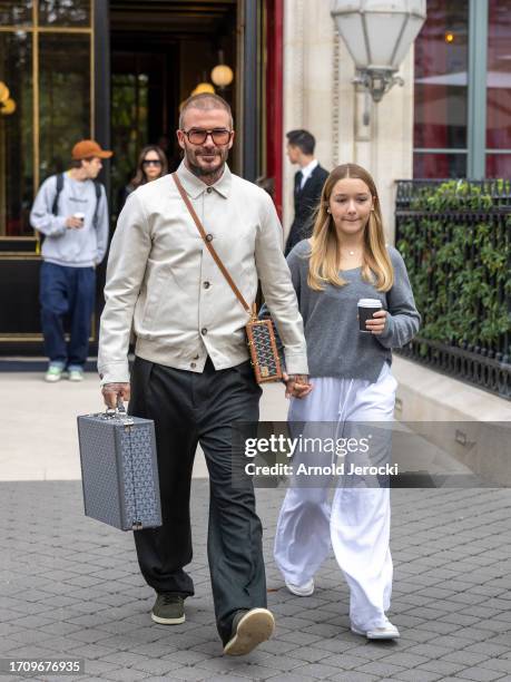 David Beckham and Harper Beckham are seen during the Womenswear Spring/Summer 2024 as part of Paris Fashion Week on September 30, 2023 in Paris,...