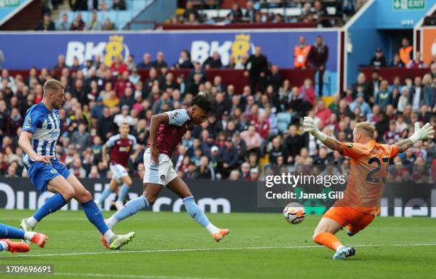 Ollie Watkins of Aston Villa scores the team's first goal during the Premier League match between Aston Villa and Brighton & Hove Albion at Villa...