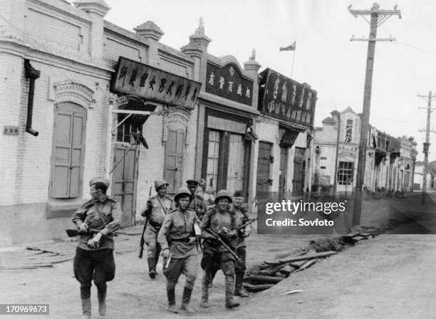 Operation august storm , automatic riflemen of the red army units of the trans-baikal front in the streets of captured hailar, manchuria, august 1945.