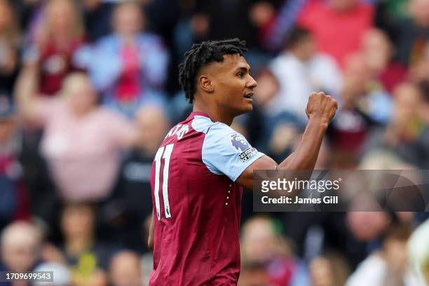 Ollie Watkins of Aston Villa celebrates after scoring the team's first goal during the Premier League match between Aston Villa and Brighton & Hove...