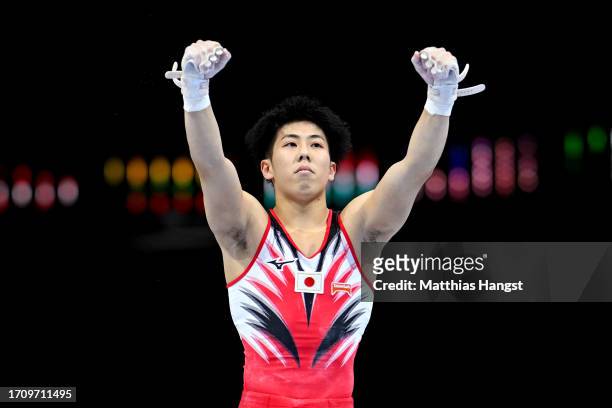 Kaito Sugimoto of Team Japan reacts after his routine on Horizontal Bar during Men's Qualifications on Day One of the FIG Artistic Gymnastics World...