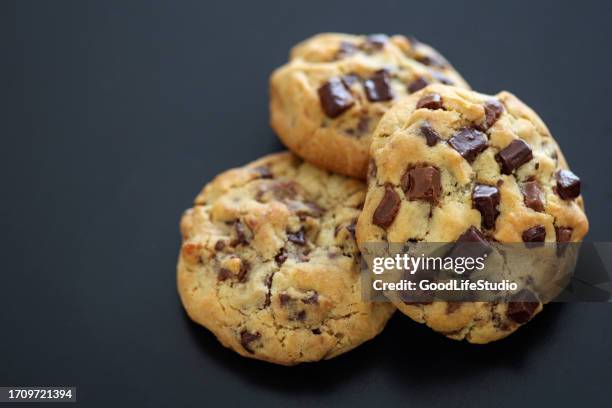 delicious chocolate chip cookies - chocolate chip stock pictures, royalty-free photos & images